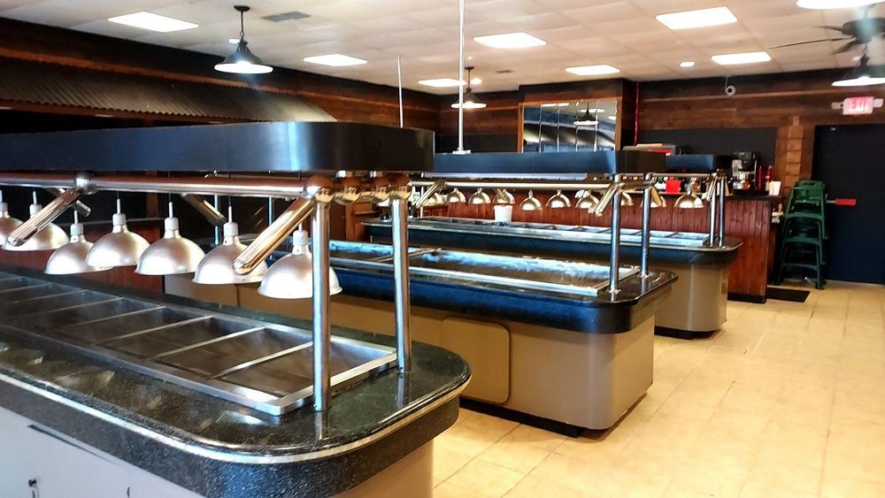 The hot buffet line under heat lamps